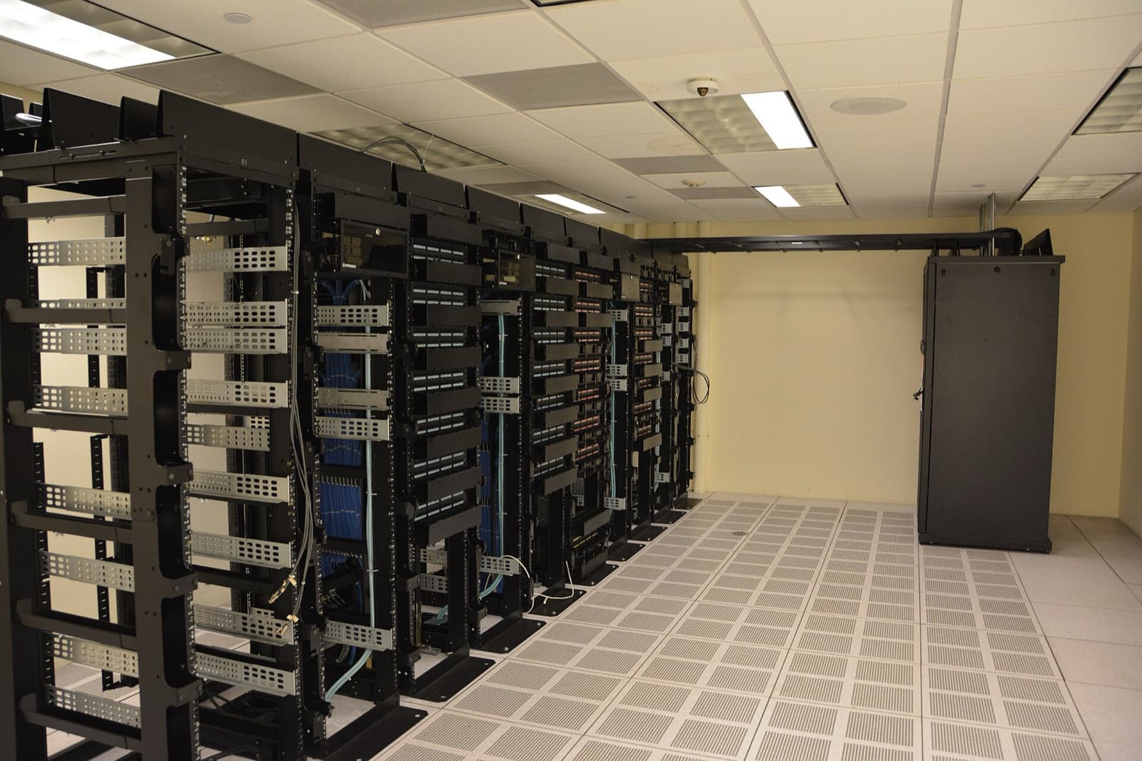 Server racks in a cooled machine room